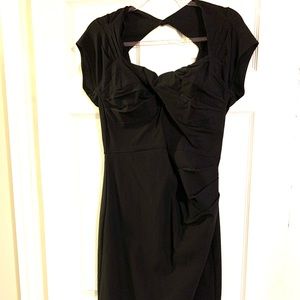 Black fitted, ruched waist, keyhole back.